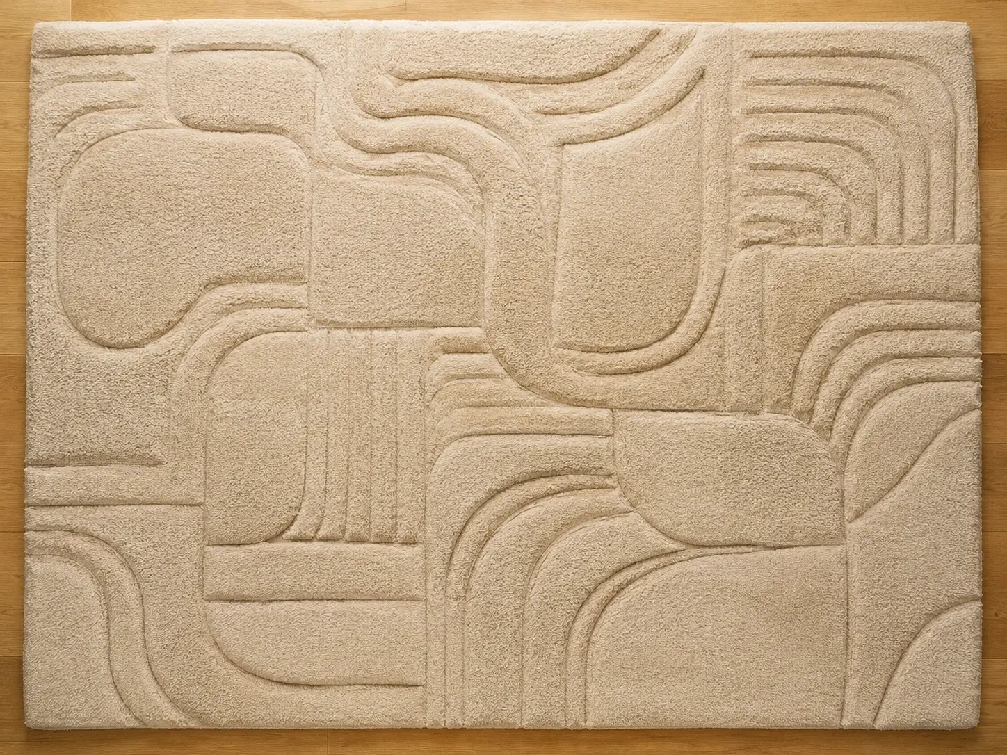 Custom pattern hand tufted carpet with carved details, top view